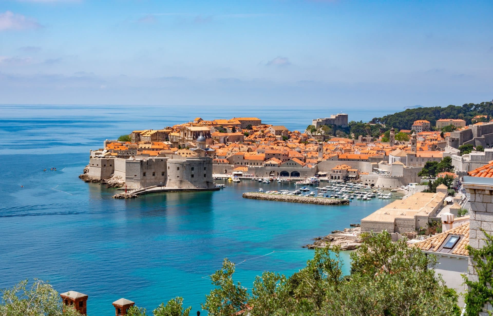 Dubrovnik old town and its harbour from the hillside above